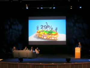© LiveWell for LIFE, Laura Raccio Caption: In Europe food accounts for 29% of greenhouse gas emissions - Enrique Garcia, LiveWell for LIFE stakeholder relations manager, presenting LiveWell for LIFE animation ‘Eat yourself healthy’ at a special plenary session. 11th International Conference on Urban health, Exchange Auditorium, Manchester Central Convention Complex, Manchester, UK 7 March 2014